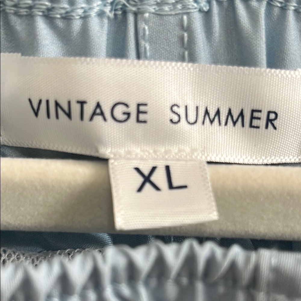 Blue and White Swim Trunks with Artistic Design - Picture 3 of 5